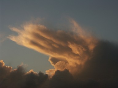  Like a hand emerging out of the clouds over West Auckland, the fingers point south